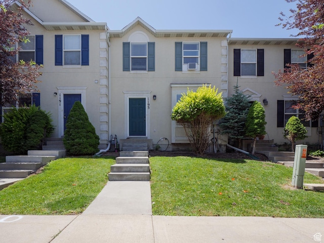 1193 W Dun Robin Ct, Murray, UT 84123 - view of property featuring stucco siding and a front lawn