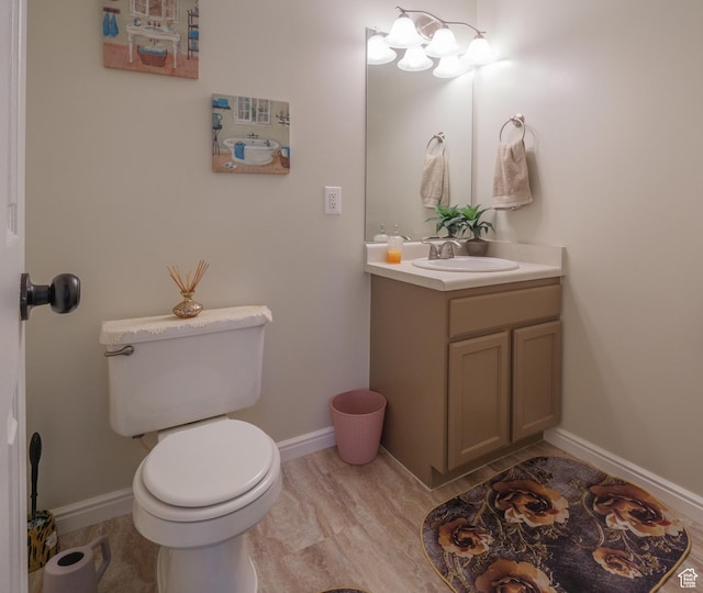 1193 W Dun Robin Ct, Murray, UT 84123 - half bathroom featuring vanity and wood finished floors