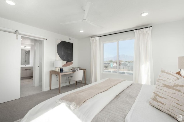 8072 S 300 E Unit 246, Midvale, UT 84070 - carpeted bedroom featuring recessed lighting, an office area, a barn door, a ceiling fan, and ensuite bathroom
