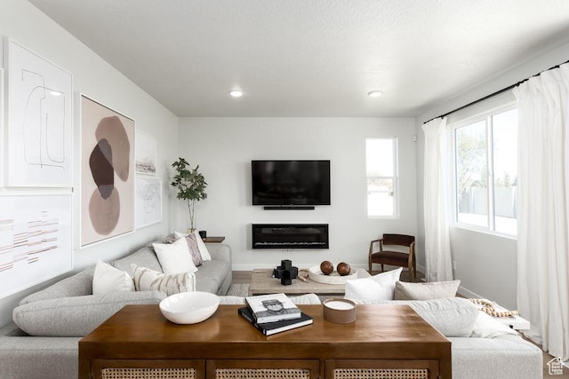 8072 S 300 E Unit 246, Midvale, UT 84070 - living room featuring a glass covered fireplace and recessed lighting