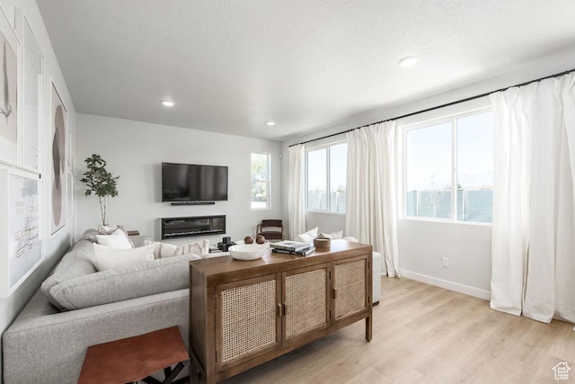 8072 S 300 E Unit 246, Midvale, UT 84070 - living area featuring light wood-style floors and recessed lighting