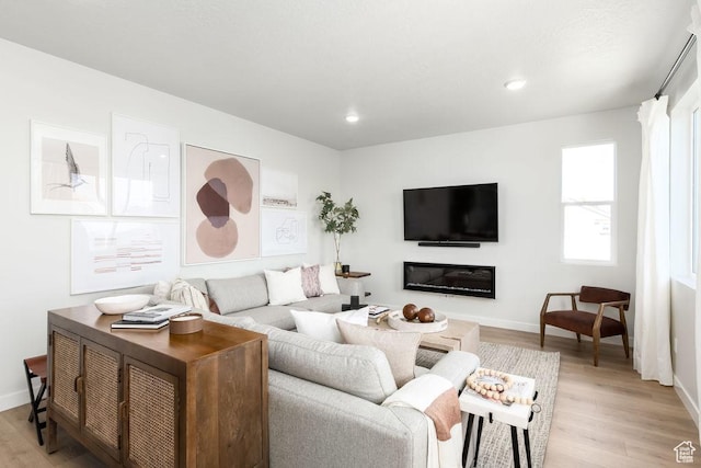 8072 S 300 E Unit 246, Midvale, UT 84070 - living area featuring light wood-type flooring and recessed lighting