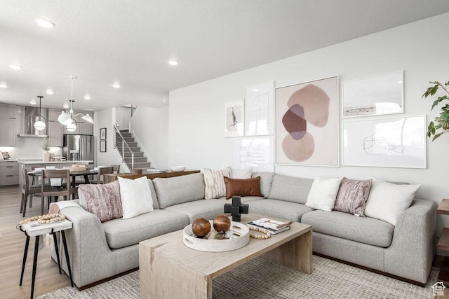 8072 S 300 E Unit 246, Midvale, UT 84070 - living area featuring stairs, light wood finished floors, and recessed lighting