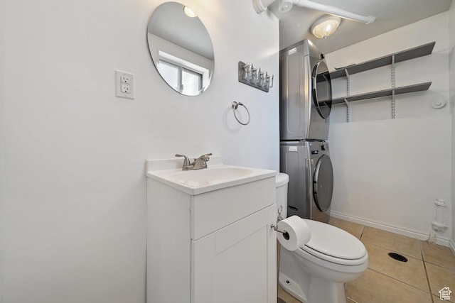 5154 S Lori Way, Salt Lake City, UT 84117 - bathroom with stacked washer / drying machine, vanity, and tile patterned floors