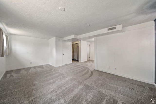 5154 S Lori Way, Salt Lake City, UT 84117 - unfurnished room featuring a textured ceiling and light carpet