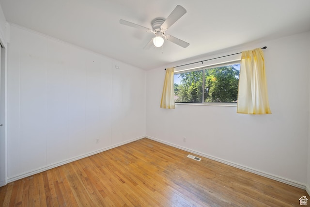 5154 S Lori Way, Salt Lake City, UT 84117 - empty room with wood-type flooring and ceiling fan