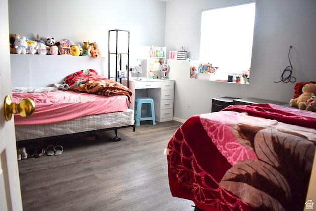1037 W State Cir, Salt Lake City, UT 84104 - bedroom with wood finished floors