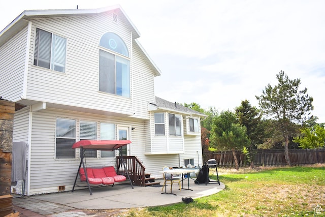 1037 W State Cir, Salt Lake City, UT 84104 - back of property with a patio area