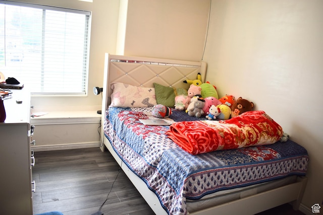 1037 W State Cir, Salt Lake City, UT 84104 - bedroom with dark wood finished floors and baseboards