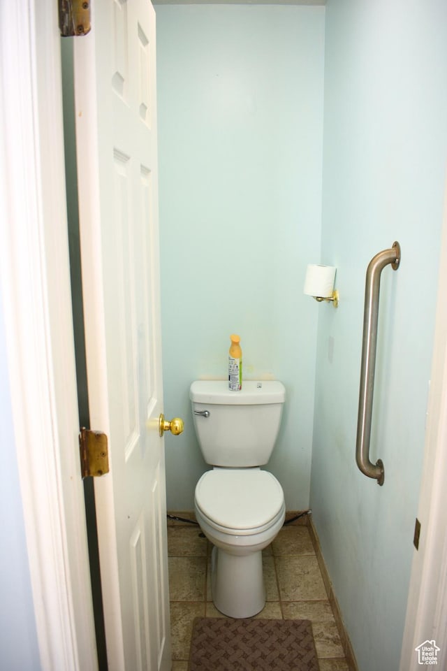1037 W State Cir, Salt Lake City, UT 84104 - bathroom featuring baseboards and toilet