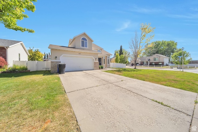 637 W Chase Ln, Centerville, UT 84014 - traditional-style home featuring driveway, brick siding, and stucco siding