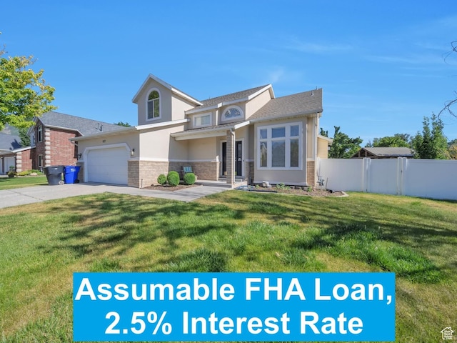 637 W Chase Ln, Centerville, UT 84014 - traditional home featuring brick siding, concrete driveway, stucco siding, and an attached garage