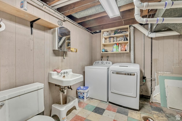322 E Crawford Ave, Murray, UT 84107 - laundry room featuring washer and clothes dryer and wooden walls