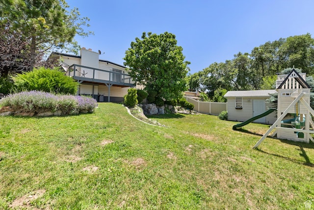 6764 S Enchanted Dr E, Midvale, UT 84047 - view of yard with a playground and a deck