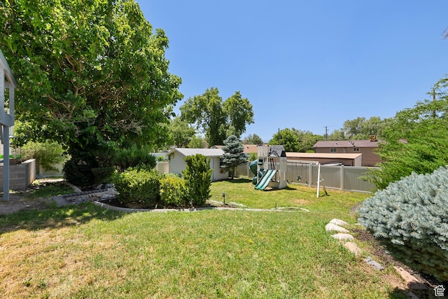 6764 S Enchanted Dr E, Midvale, UT 84047 - view of yard featuring a playground