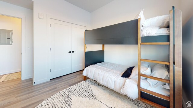 1378 S Sawmill Blvd Unit 7-703, Heber City, UT 84032 - bedroom featuring electric panel, wood finished floors, and a closet