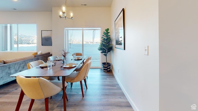 1378 S Sawmill Blvd Unit 7-703, Heber City, UT 84032 - dining space with a chandelier and wood finished floors