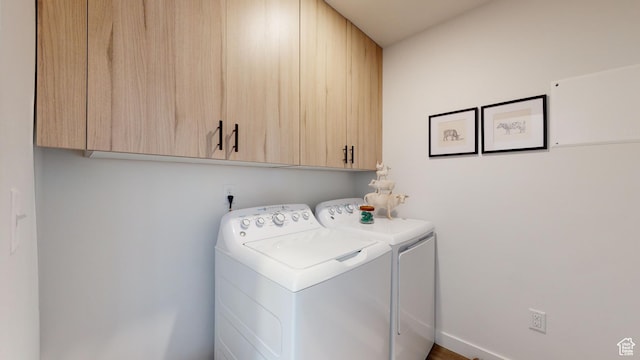 1378 S Sawmill Blvd Unit 7-703, Heber City, UT 84032 - laundry area with cabinet space and washing machine and clothes dryer