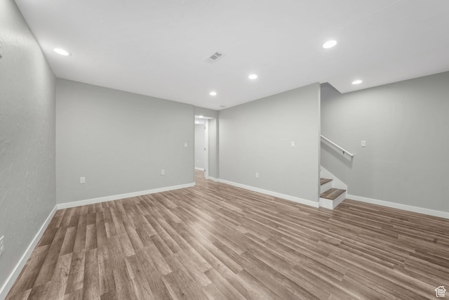 153 E Main St Unit B, Santaquin, UT 84655 - spare room featuring light wood-style floors, stairway, and recessed lighting