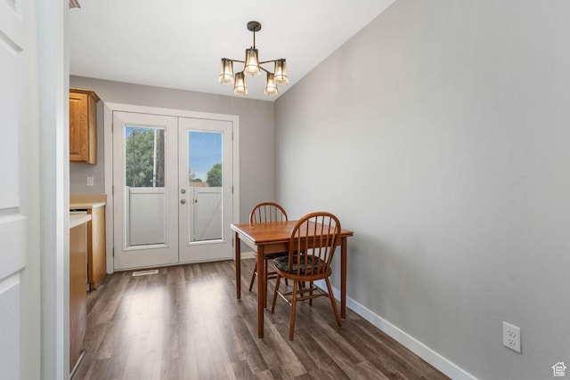 153 E Main St Unit B, Santaquin, UT 84655 - dining area with french doors, dark wood-type flooring, and a chandelier