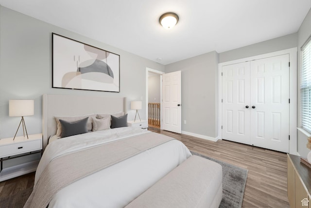153 E Main St Unit B, Santaquin, UT 84655 - bedroom featuring wood finished floors, multiple windows, and a closet