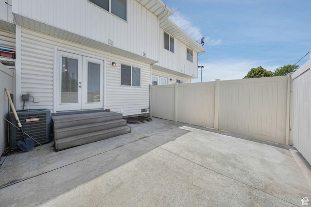 153 E Main St Unit B, Santaquin, UT 84655 - fenced backyard with french doors, a patio, and entry steps