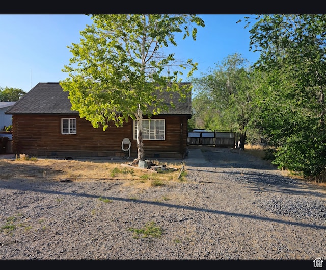 268 W Peach St, Grantsville, UT 84029 - view of side of property featuring roof with shingles