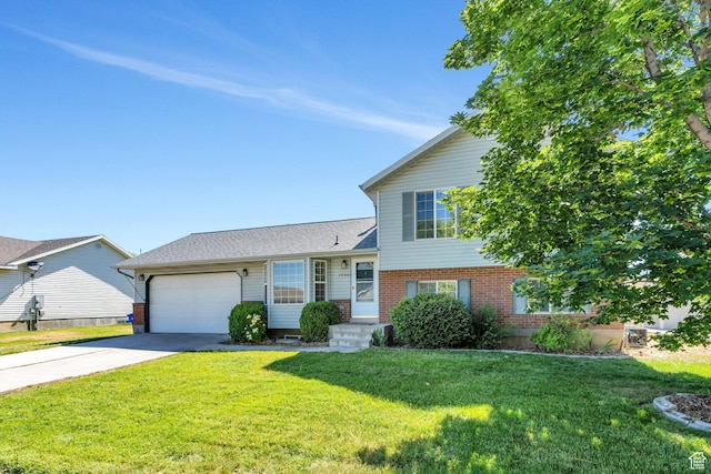 2086 N 1100 E, Lehi, UT 84043 - split level home featuring an attached garage, a front yard, driveway, and brick siding