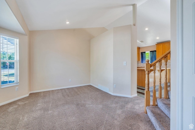 2086 N 1100 E, Lehi, UT 84043 - spare room with vaulted ceiling, carpet flooring, plenty of natural light, stairway, and recessed lighting