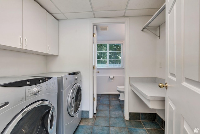 2086 N 1100 E, Lehi, UT 84043 - laundry area with washer and dryer, dark tile patterned floors, and cabinet space