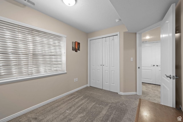 13574 S Cantania Way, Draper, UT 84020 - unfurnished bedroom featuring carpet floors, a closet, and a textured ceiling