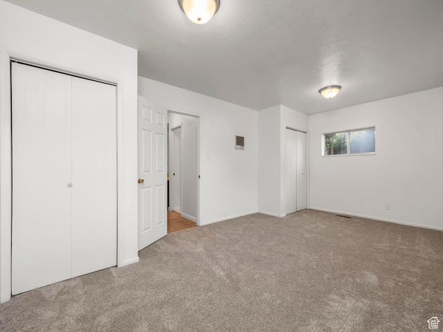 550 S 700 W, Payson, UT 84651 - unfurnished bedroom with carpet flooring and multiple closets