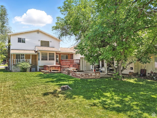 550 S 700 W, Payson, UT 84651 - rear view of property with a hot tub, a yard, a patio, and brick siding