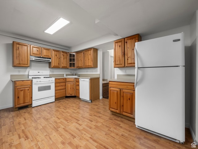 550 S 700 W, Payson, UT 84651 - kitchen featuring white appliances, extractor fan, light wood finished floors, and light countertops