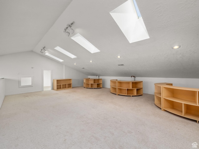 550 S 700 W, Payson, UT 84651 - bonus room featuring a skylight, lofted ceiling, carpet flooring, and recessed lighting