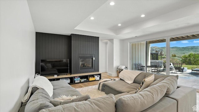 3224 Farm Ridge Ct, Mountain Green, UT 84050 - living area featuring recessed lighting, light wood-style flooring, and a large fireplace