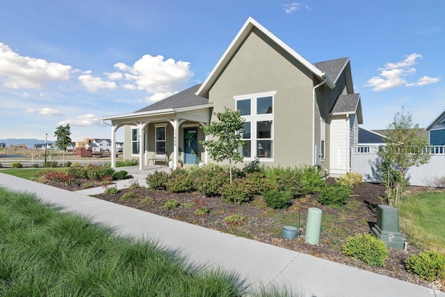11449 S Bingham Rim Rd, South Jordan, UT 84009 - view of front of property with a porch and stucco siding