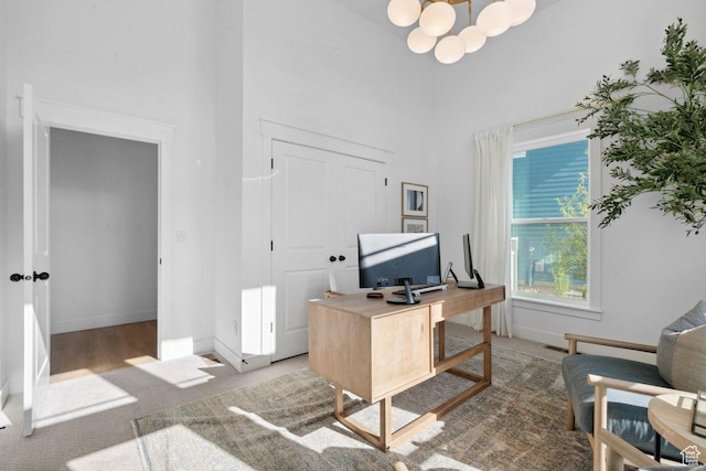11449 S Bingham Rim Rd, South Jordan, UT 84009 - office space featuring a towering ceiling, light colored carpet, and a chandelier