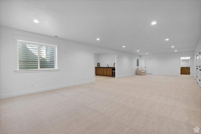11449 S Bingham Rim Rd, South Jordan, UT 84009 - unfurnished living room featuring recessed lighting and light colored carpet