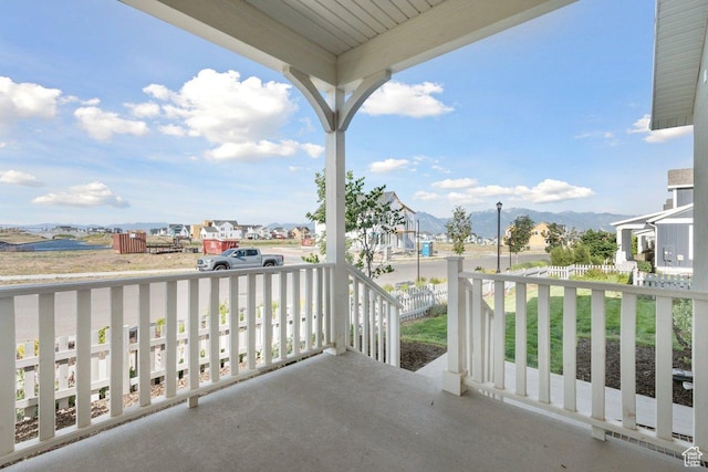 11449 S Bingham Rim Rd, South Jordan, UT 84009 - covered porch featuring a mountain view and a residential view