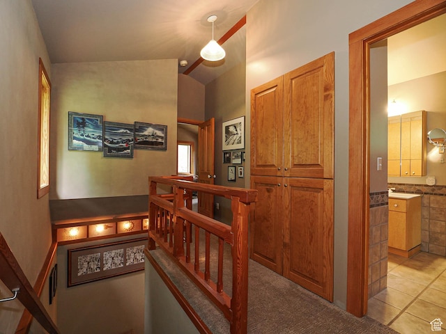 2137 N Pinecrest Canyon Rd Unit 35, Emigration Canyon, UT 84108 - corridor with lofted ceiling and light tile patterned floors