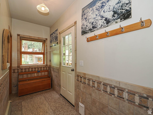2137 N Pinecrest Canyon Rd Unit 35, Emigration Canyon, UT 84108 - doorway to outside with tile walls, wainscoting, and a baseboard radiator