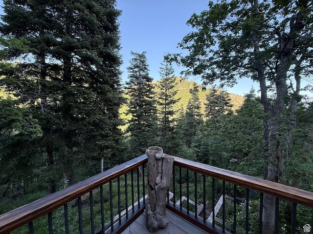2137 N Pinecrest Canyon Rd Unit 35, Emigration Canyon, UT 84108 - wooden terrace featuring a wooded view