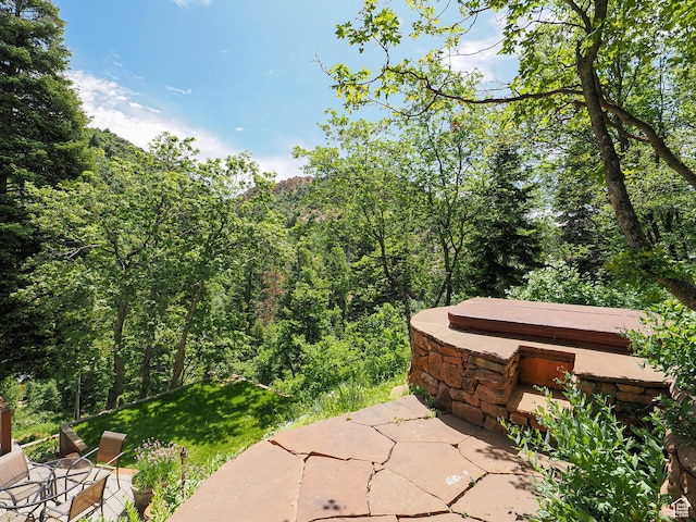 2137 N Pinecrest Canyon Rd Unit 35, Emigration Canyon, UT 84108 - view of patio / terrace featuring a forest view