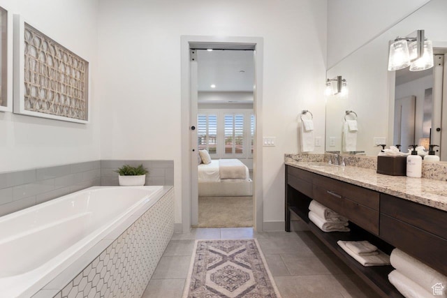 3780 W Arcadia Dr Unit 25, Santa Clara, UT 84765 - ensuite bathroom featuring vanity, a bath, and tile patterned flooring