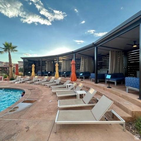3780 W Arcadia Dr Unit 25, Santa Clara, UT 84765 - community pool with a patio area and a ceiling fan