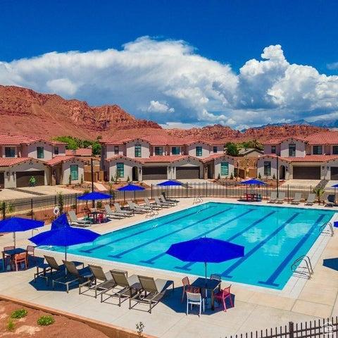 3780 W Arcadia Dr Unit 25, Santa Clara, UT 84765 - community pool featuring a mountain view and a patio