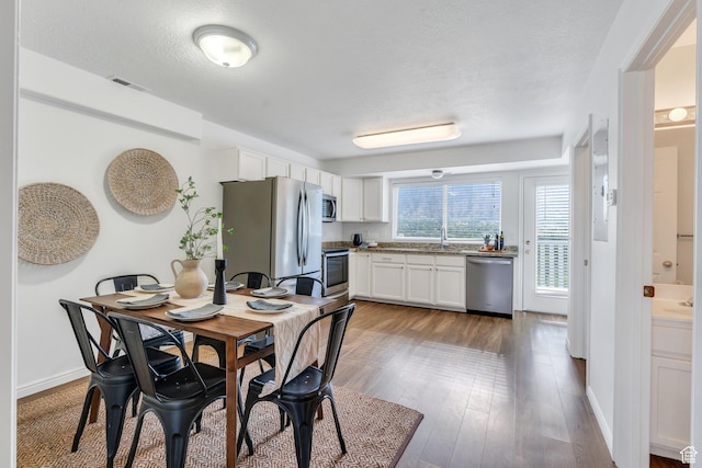1747 S 750 E, Orem, UT 84097 - dining room featuring dark wood-style floors and baseboards