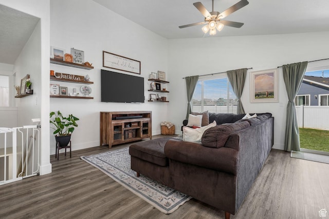 893 N 300 W, Santaquin, UT 84655 - living room featuring wood finished floors, healthy amount of natural light, a ceiling fan, and vaulted ceiling