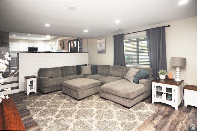2857 W 2250 N, Clinton, UT 84015 - living room featuring dark wood-style flooring and recessed lighting